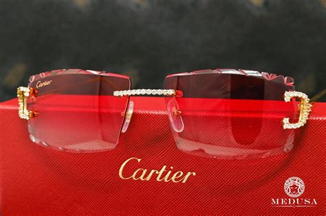 red cartier glasses with diamonds.